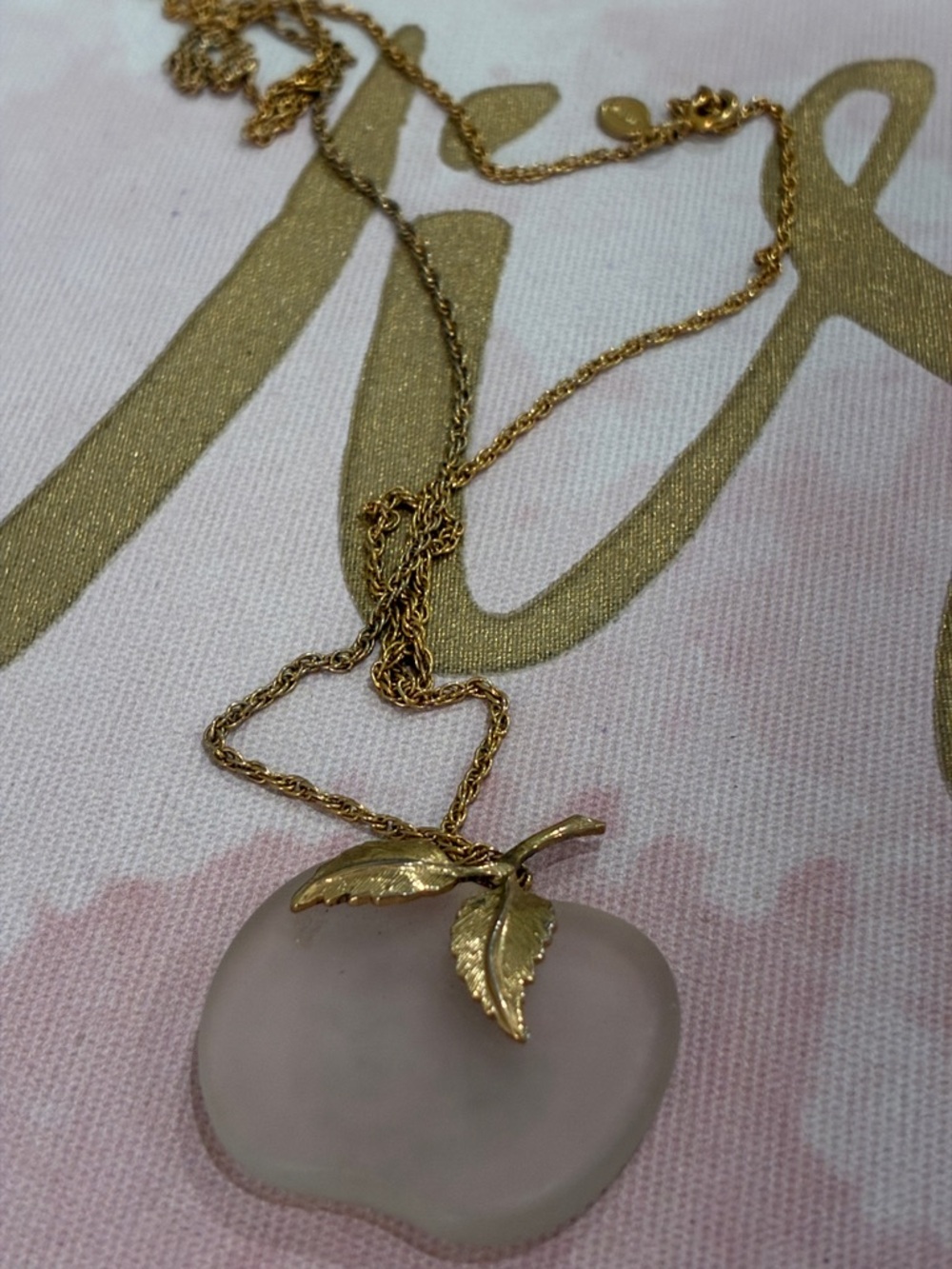 Gold-Tone Apple Pendant Necklace with Pink Glass Charm